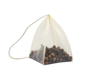 A bag filled with nuts sitting on a table, great for food or decoration