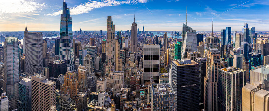 New York City skyline with Empire State Building on clear daytime view