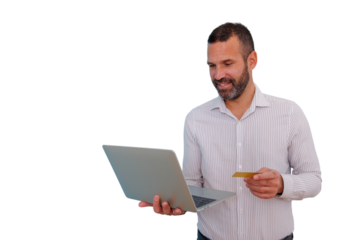 Man smiling while holding a laptop and credit card, engaging in secure online shopping and transactions. Transparent background