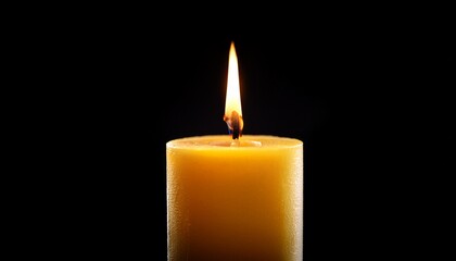 Yellow Candle Light Burn Against Black Background