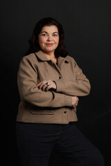 Studio portrait of adult woman of Latin American ethnicity