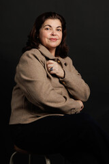 Studio portrait of adult woman of Latin American ethnicity