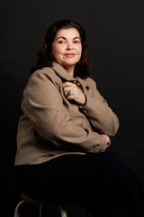 Studio portrait of adult woman of Latin American ethnicity