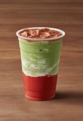 In the caf&eacute;, layered drinks come in green matcha, white milk, and red strawberry sauce, and sweet drinks are part of the menu