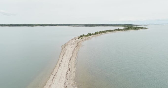 Aerial view of S&auml;&auml;retirp, a narrow peninsula or spit extending into the sea from Kassari island in cloudy spring weather, Hiiumaa, Estonia.
