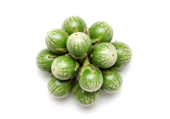 Pile of fresh green Thai eggplants isolated on white background