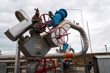 Pipes and caps for pipelines leading from oil and gas fields to storage tanks, energy self-sufficiency concept, global market forecast concept