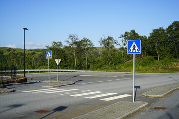Pedestrian crosswalk on a quiet suburban road in Norway