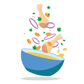 Chicken soup on a white background. soup ingredients fly into the plate