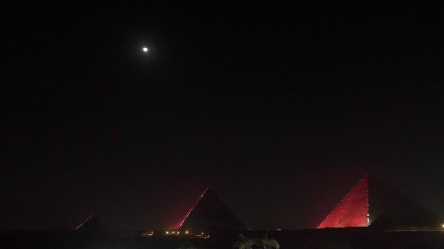 Cairo,Egypt - December 2, 2025:  Illumiated Khufu Pyramid and Khafre's Pyramid in Egypt