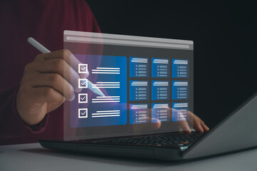 Electronic smart checklist approve and document on virtual screen concept. Businessman check electronic document on digital document, paperless office, working on borderless communication technology.