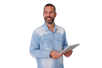 Man with beard and denim shirt holding digital tablet, smiling and looking away, business technology concept on transparent background