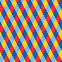 Bold seamless argyle diamond pattern in red, yellow and blue with stitched lines. Classic preppy background for fabric, fashion, wallpaper and packaging.