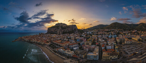 Panoramic aerial drone view of the Cefalu , Sicily, Italy by sunrise. Litttle town in Sicily near Palermo. Travel concept. August 2024