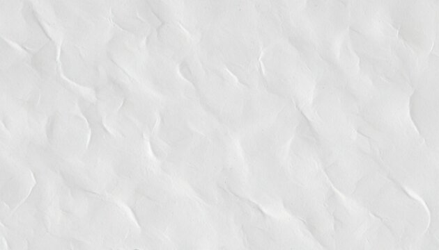 Close-up of white sand texture with wavy patterns and ridges, against a plain white background.