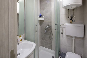 Bathroom interior with shower cabin