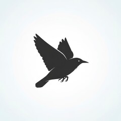 Obraz premium Simple black bird silhouette in flight icon isolated on a white background.