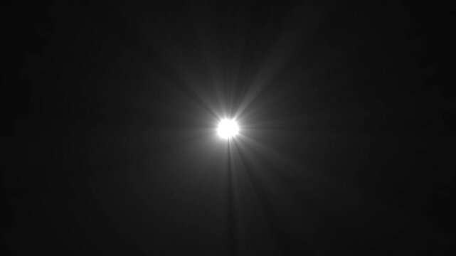 Optical flare with light rays on black background alpha chenel. shine light lens flares flickering animation overlays.