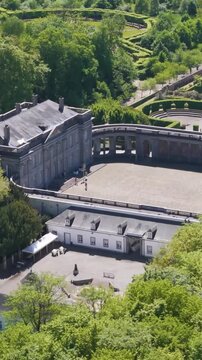 main buildings structures ch&acirc;teau seneffe along parks ponds visitors walking grounds contribute lively to left right pans aerial of de belgium 
