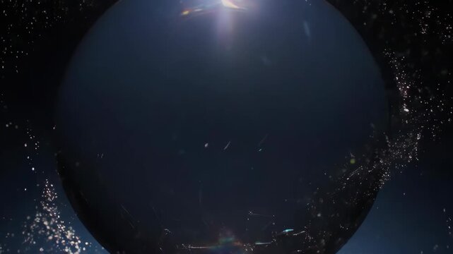 A dark sphere is shattered, revealing broken lines against a starlit background