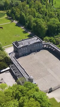 ch&acirc;teau seneffe full area numerous buildings grounds green cover trees surrounding estate create picturesque landscape circles aerial of de belgium 