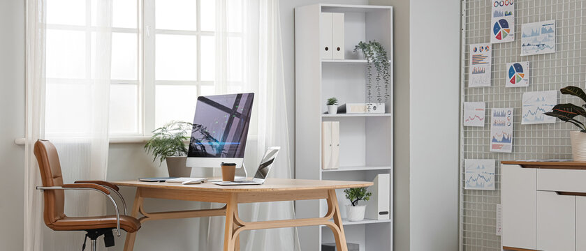 Interior of light data scientist's office with workplace - Powered by Adobe