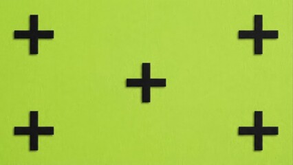 Obraz premium Five black cross shapes centered on a vibrant green background