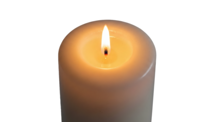 Soft white candle burning with gentle flame on black background