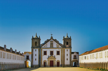 Fototapeta premium The baroque Sanctuary of Our Lady of Cabo Espichel (Santuário de Nossa Senhora do Cabo Espichel), a historic religious complex perched on dramatic cliffs in Sesimbra, Portugal, Setubal, 