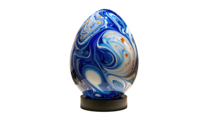 Glossy egg with swirling patterns of blue, white, and gold on a black base, isolated on a black background