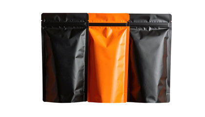 Three pouches stand two black, one orange, against a black backdrop, showcasing packaging aesthetics