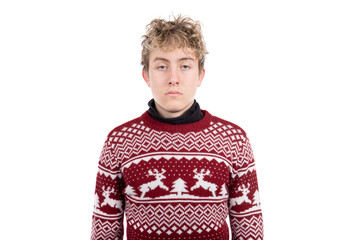 Sullen teenage boy unwillingly wearing a Christmas Sweater