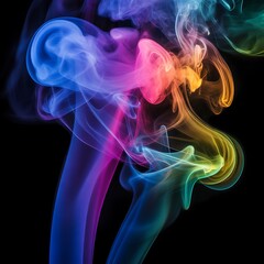 Obraz premium Vibrant multicolored smoke swirling dynamically against black background