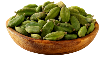 Whole dried green cardamom pods piled in a wooden bowl, showcasing their ribbed texture and aroma for culinary uses in cooking and baking spice blends