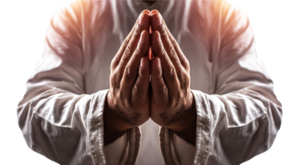 Closeup of a persons hands clasped together in prayer or meditation, signifying peace, spirituality, and reflection, perfect for religious or wellness themes.