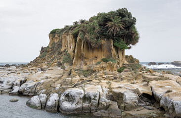 Heping Island Park, The iconic eroded Lion Rock (or Sphinx Rock) formation, one of the ten famous "Guardian Rocks" in the unique coastal geopark landscape, Taiwan.