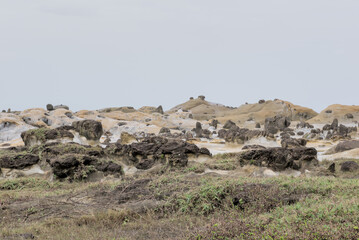 Unique mushroom rock formations and weathered sandstone geological landscape at heping island park along the coastline of keelung, taiwan.