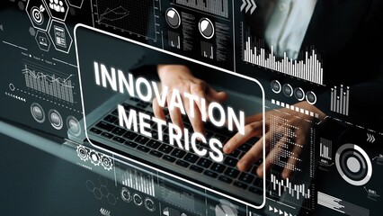 Hands Typing on Laptop with Overlay of Digital Innovation Metrics and Graphs for Business Analysis and Strategy Development. Asymptotic smart data analytic.