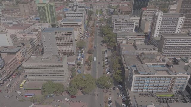 Tilt up reveal drone shot of Nairobi city central, Moi avenue downtown street