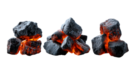 Glowing hot embers and dark coals arranged in three piles on a white surface, perfect for representing energy, heat, or industrial themes.