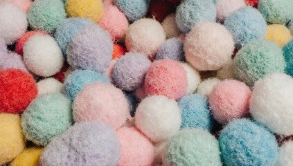 Vibrant pastel and bright pom-poms piled together create a soft, playful texture &mdash; perfect for kids&rsquo; crafts, party decor, or cheerful design projects