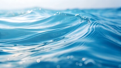Gentle ocean waves with sparkling blue water