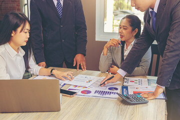 Team business marketing meeting to discuss the situation on business plan, marketing for investment. Selected focus