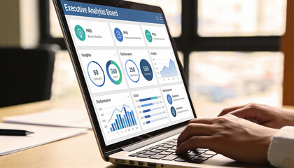 Executive analytics board displays performance metrics and insights on laptop, showcasing data visualization and analysis in modern workspace