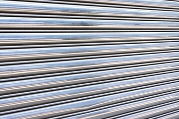 Shiny metallic roll up steel door pattern perspective background
