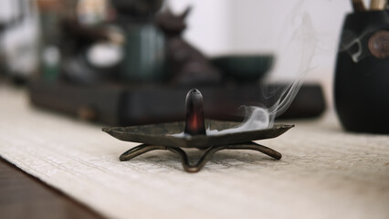 Ritual flame. Spiritual practice. Tools for meditation yoga activity mental health smoke destress oriental calming atmosphere.