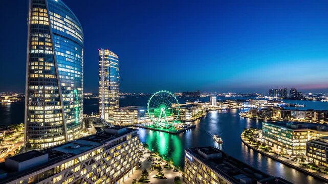 Dubai marina skyline at dusk with ain dubai ferris wheel illuminated, 4k high quality video