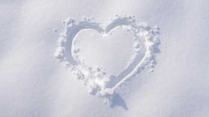 Winter heart. Love sign on snow. Snowy heart. Love shaped in snow. Snow heart design for winter banner. Heart love symbol in snow.