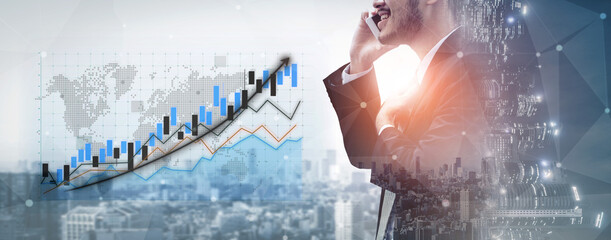 A business professional engages in a phone conversation while analyzing data trends with a dynamic city skyline, representing growth and technology integration. Impute