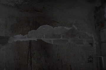 Wall preparation: Deep cleaning surfaces and ceilings with a broom before painting in home renovation project